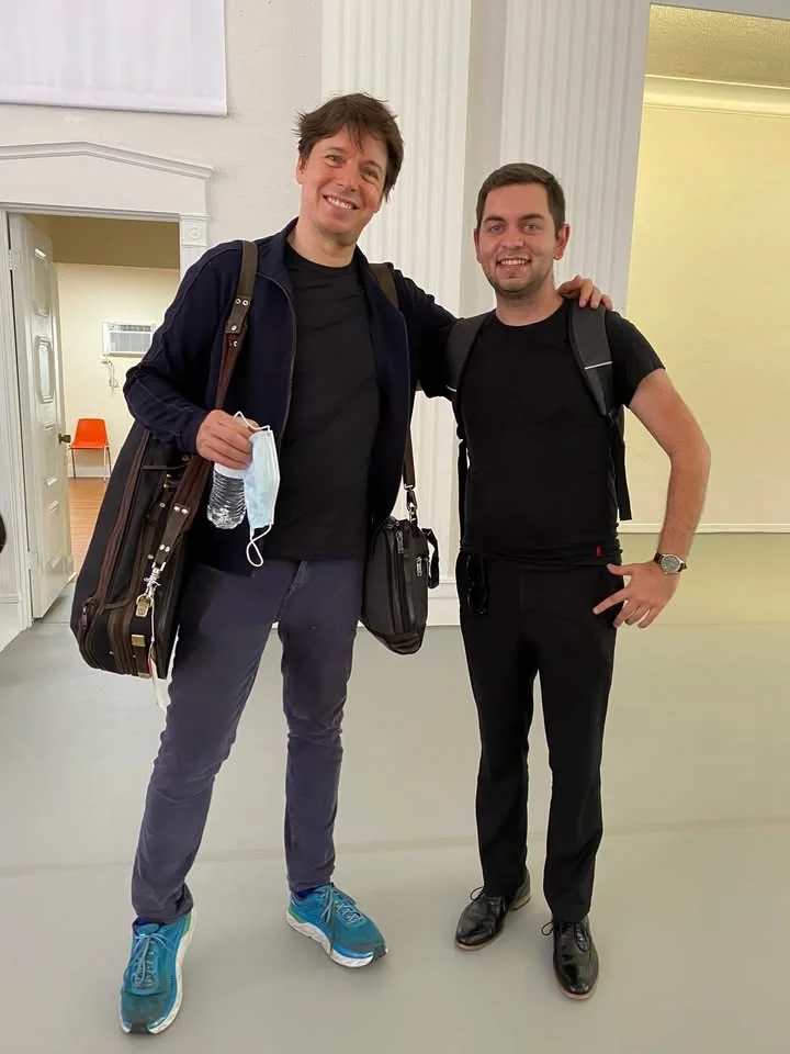 David pictured with Joshua Bell at a Miami Chamber Music Society event